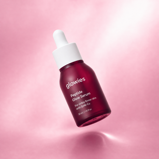 Peptide Glow Serum bottle on blush gradient